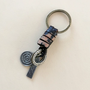 Retro braided leather keychain with bronze alloy pendants and engraved metal tags