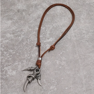 Vintage men's necklace with three antique silver eagle claw pendants on brown leather cord