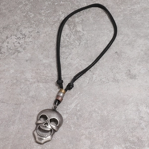Gothic skull pendant necklace with black leather cord and tricolor metal rings decor