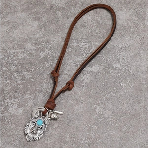 Vintage wolf head pendant necklace with turquoise on adjustable brown leather cord