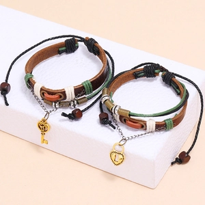 Ensemble de bracelets de couple en cuir tressé rétro avec pendentifs cadenas et clé