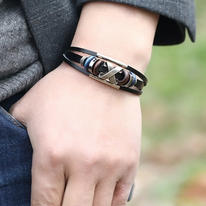 Mens multi-layer braided leather bracelet with vintage metal beads and wooden charms