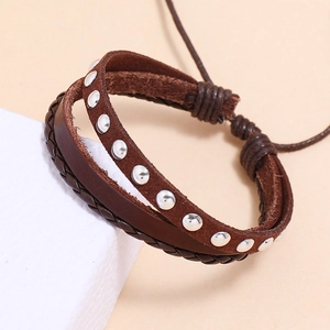 Multilayer vintage brown leather bracelet with silver rivets and adjustable braided cord