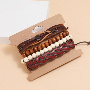 Retro 4-piece men's leather bracelet set with wooden beads and woven ropes on display