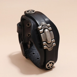 Detail of punk style multi-layer black leather bracelet with retro silver metal rivets