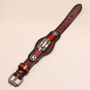 Macro view of vintage brown leather multilayer bracelet with silver star metal rivets