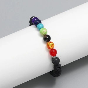 Seven chakra elastic bracelet with colorful beads and black volcanic lava stones