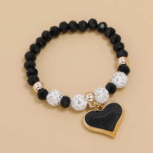Minimalist black crystal beaded bracelet with faceted beads and enamel heart pendant