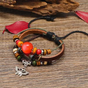 Multilayer leather beaded bracelet featuring butterfly charm and autumn leaf decor