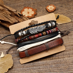 Bohemian multilayer leather bracelet set featuring vintage silver feather charm and beads