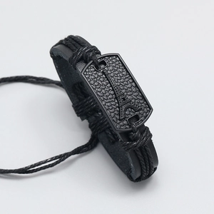 Braided black leather bracelet with adjustable cord and 3D Eiffel Tower metal charm