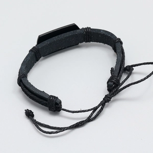 Minimalist black braided leather bracelet with adjustable slide knot and metal plate