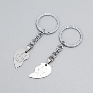 Silver heart-shaped interlocking Best Friends Forever keychains for couples or friends
