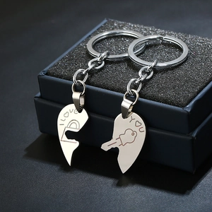 Gepolijste roestvrijstalen hart puzzel sleutelhanger set voor stellen met I LOVE YOU