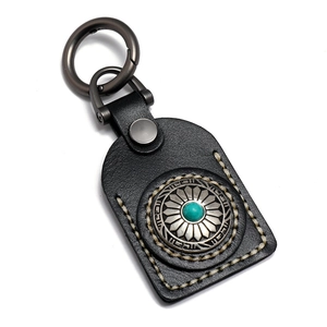 Handmade vintage black leather car keychain with turquoise concho and silver sunflower metal