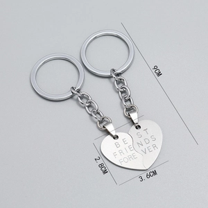 Silver stainless steel heart puzzle keychain set engraved with Best Friends Forever text