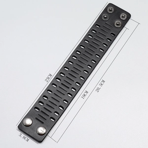 Detailed view of punk style wide leather bracelet with silver buttons and size measurements