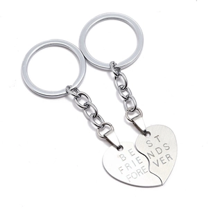 Minimalist stainless steel heart puzzle keychain set with Best Friends Forever engraving