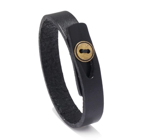 Vintage black leather bracelet with antique gold button clasp and raw cut texture