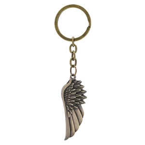 Vintage bronze metal feather keychain with detailed textures on white background