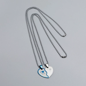 Couples heart puzzle necklace in stainless steel with love you engraving on ball chain