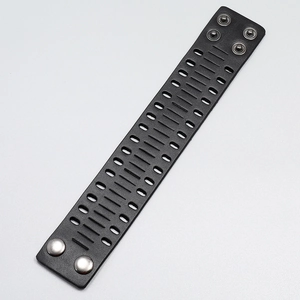 Punk style wide black leather bracelet with hollow cutouts and silver snap buttons
