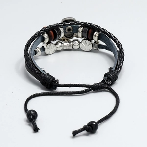 Handmade multi-layer leather bracelet for men featuring cross beads and peace sign charm