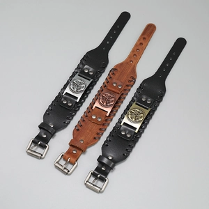 Three vintage braided leather bracelets with Viking metal charms and pin buckle straps