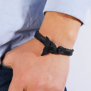 Men's braided black leather bracelet with stylish black whale tail anchor clasp