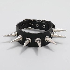 Punk black leather bracelet with long silver metal spikes and adjustable buckle closure