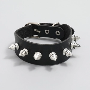 Punk black leather bracelet featuring silver cone studs and adjustable metal buckle