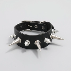 Punk black leather bracelet with large silver metal spikes and adjustable buckle strap