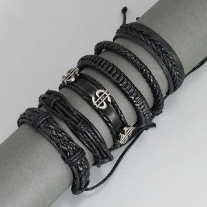 6-teiliges schwarzes Set aus geflochtenen Lederarmbändern mit Dollarzeichen-Anhängern