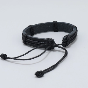 Handmade black braided leather bracelet featuring adjustable knots for men and women