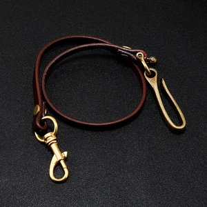 Retro brown leather pant chain with brass snap hooks for vintage streetwear style