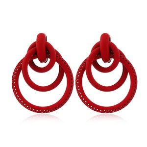 Red geometric interlocking round drop earrings with matte finish and hollow dot texture