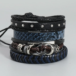 Detailed close-up of men's multilayer braided leather bracelets with metal charms