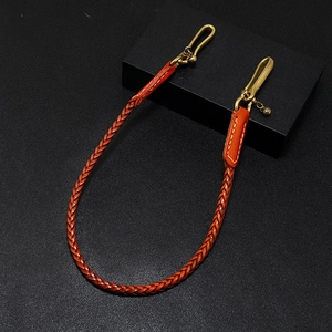 Chaîne de pantalon tressée en cuir orange faite main avec mousquetons en laiton pour hommes