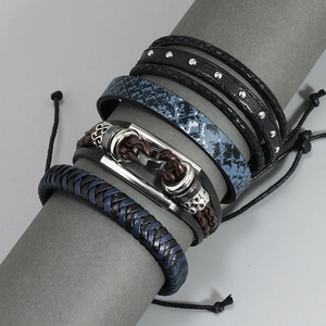 Men's multi-layer braided leather bracelet set with skull charm and metal studs