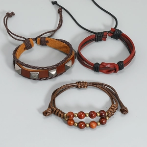 Three-piece set of handmade brown leather bracelets with beads and woven cords for men