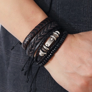 Men's vintage layered braided leather bracelets set with metal beads and charms