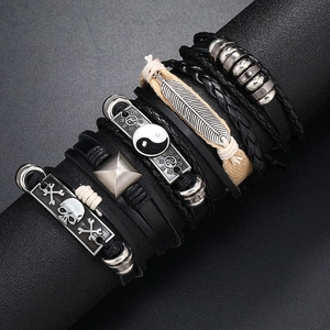 Retro punk multi-layer leather bracelet set with skull, feather and yin-yang charms