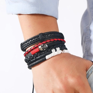 Handmade multilayer bohemian leather bracelet set for men featuring skull charms