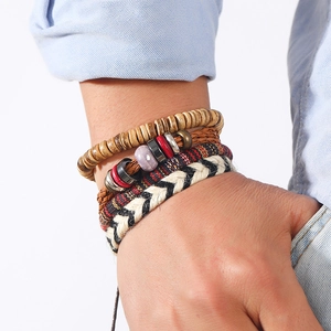 Handmade 4-piece bohemian layered bracelet set with wood beads and braided leather cords