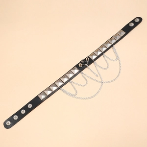 Punk black leather choker with silver studs, metal rings, and layered metal chains