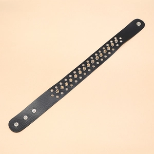 Punk rock black leather choker with three rows of silver metal spikes and snap closure
