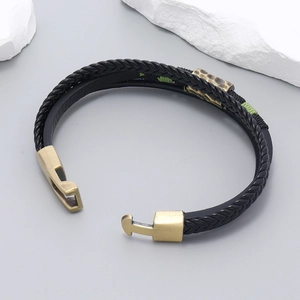 Multilayer black woven leather bracelet with vintage bronze buckle and green accents