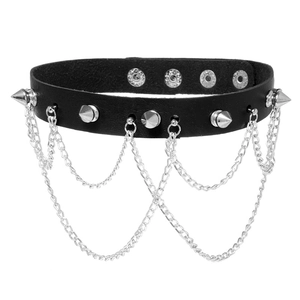 Punk black leather choker with silver conical studs and layered metal chains on white background