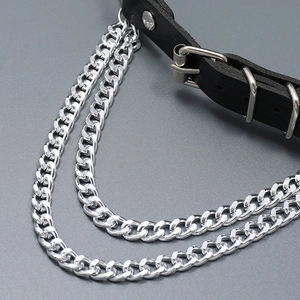 Detail of gothic leather choker featuring multiple silver cuban link metal chains