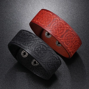 Vintage leather bracelet set with Celtic knot embossing and adjustable metal snaps